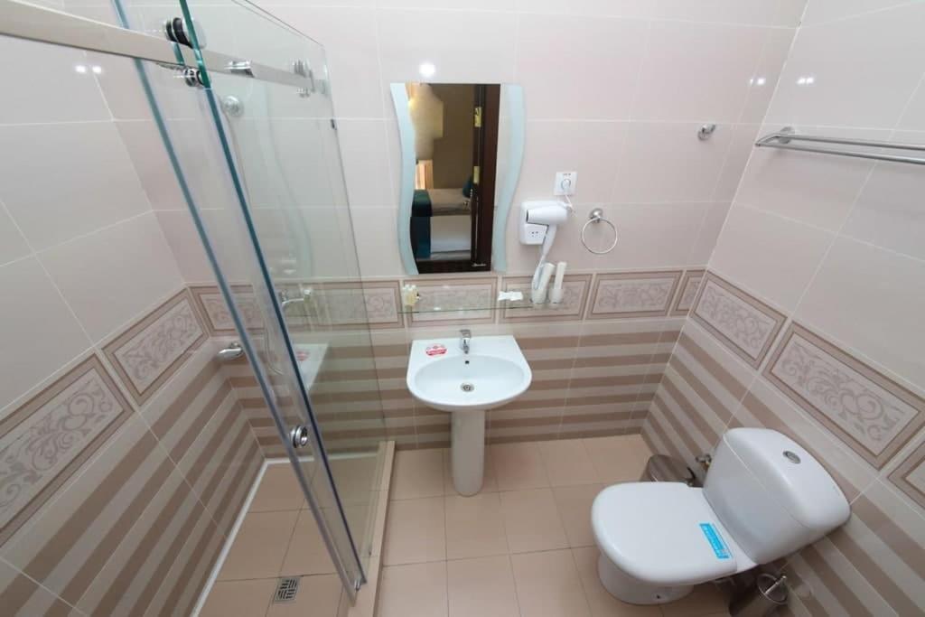Globus Hotel - 塔什干全球商务宾馆 Teshabayguzar Exteriör bild