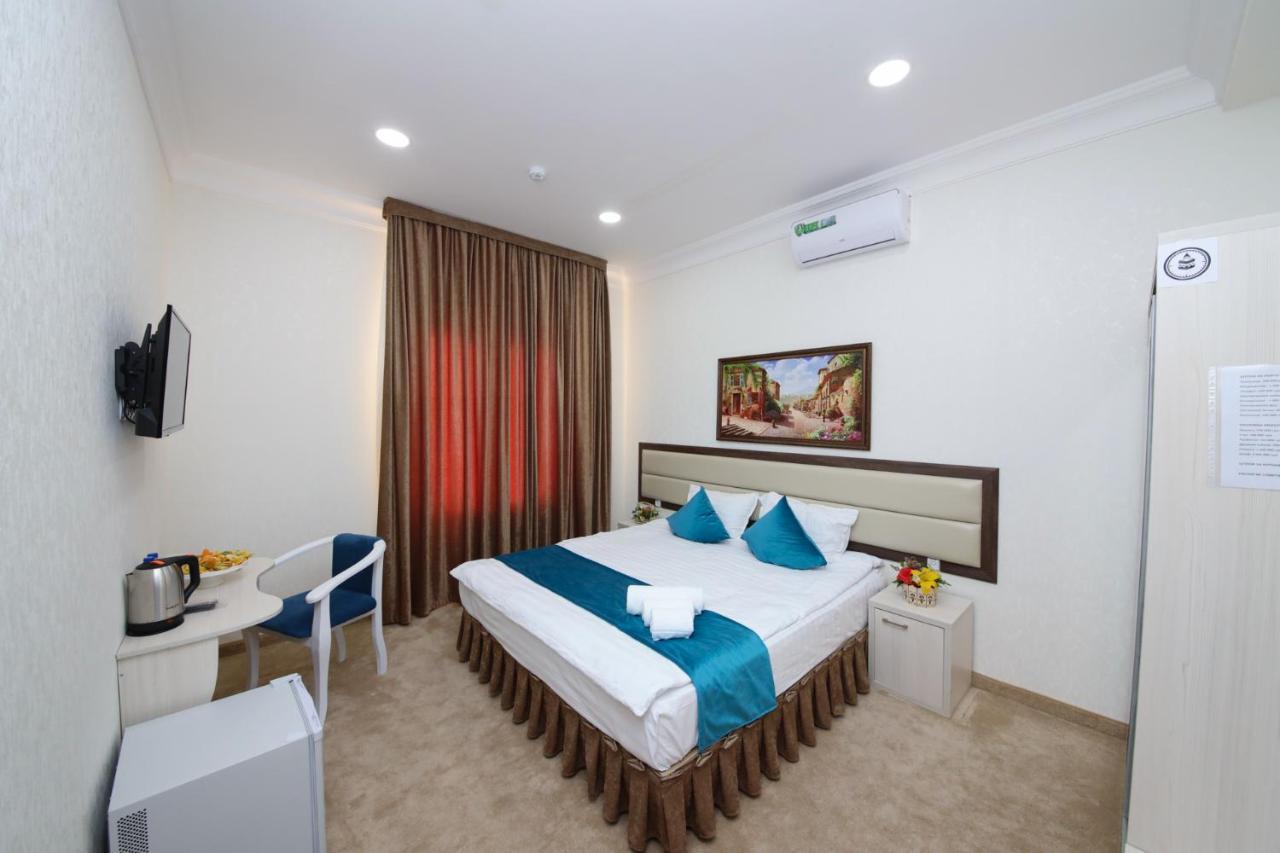 Globus Hotel - 塔什干全球商务宾馆 Teshabayguzar Exteriör bild